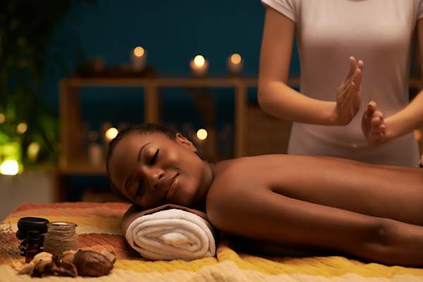 Woman gets a massage at a spa.