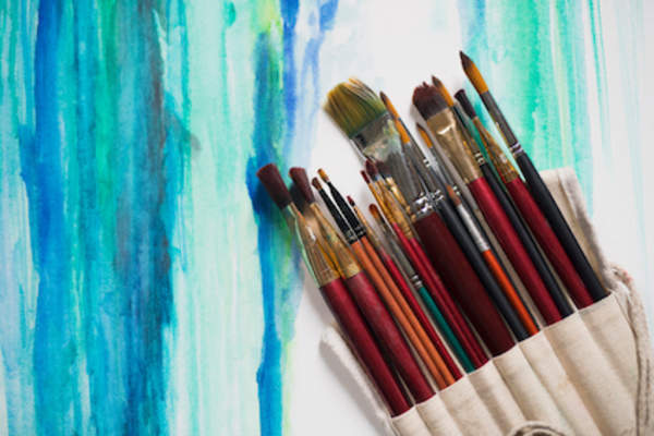 Paint on canvas and paint brushes
