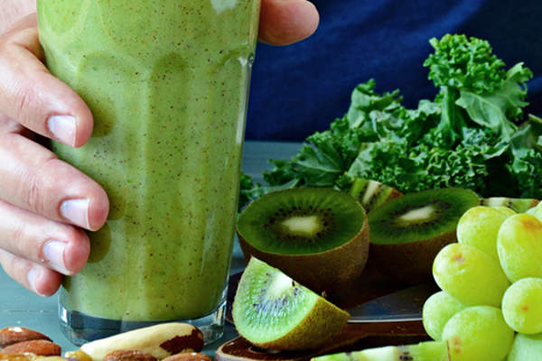 man making smoothie image