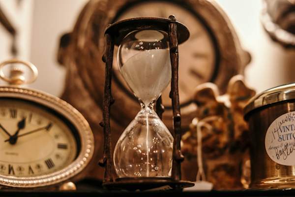 hourglass and clocks