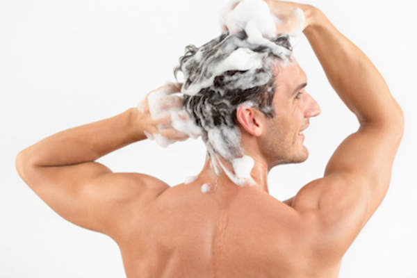 Man washing hair.