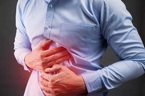 Man with stomach pain.