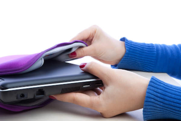 Removing laptop from case.