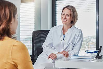 Doctor helping patient find the right treatment.