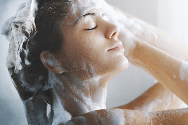 Woman washing her hair.