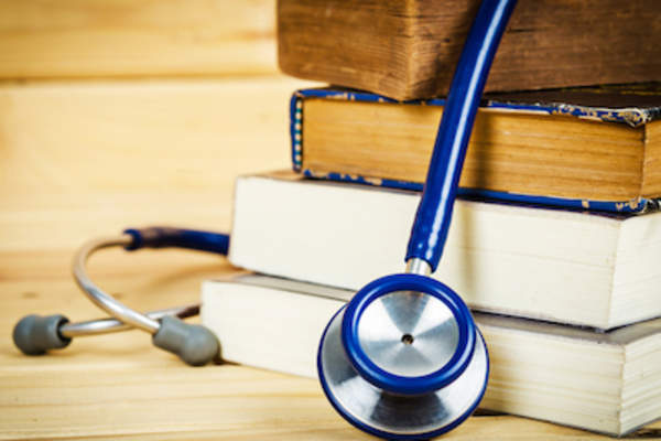 Stethoscope on books.