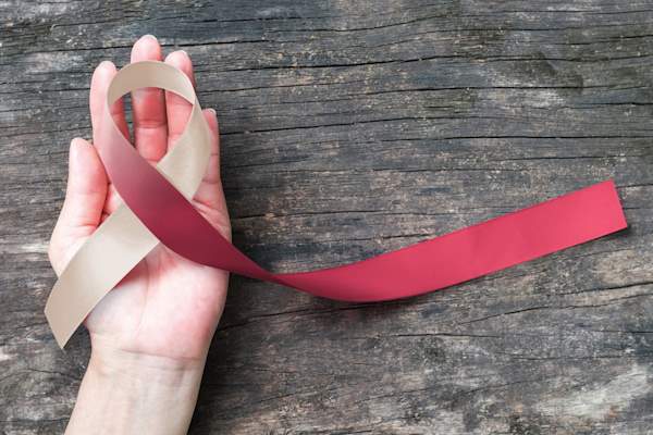 Head and neck cancer awareness with burgundy ivory color ribbon