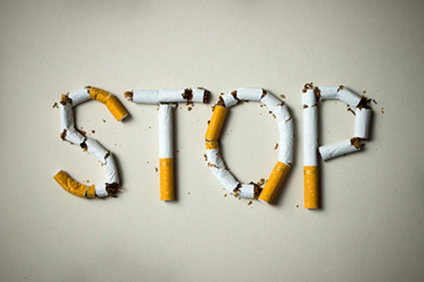 Stop spelled in cigarettes.