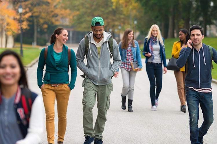 College students walking on campus.