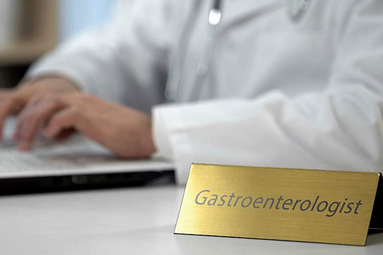Gastroenterologist ordering diagnostic tests.
