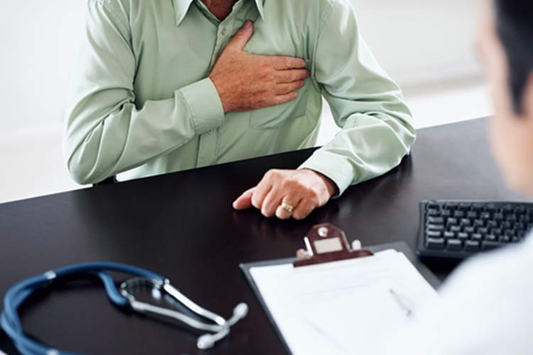 Man visits his doctor for chest pain.