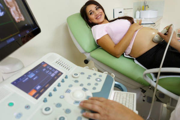 Checking on baby with ultrasound.