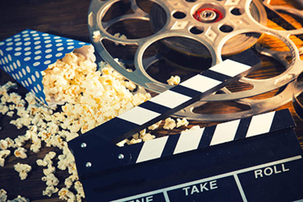 Popcorn and film reel.