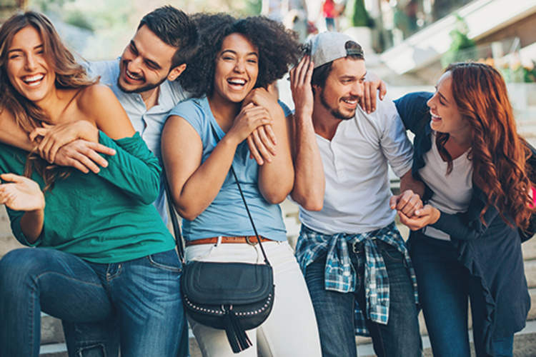 Group of friends laughing.