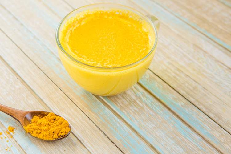 Golden turmeric milk. Healthy and aromatic detox beverage.