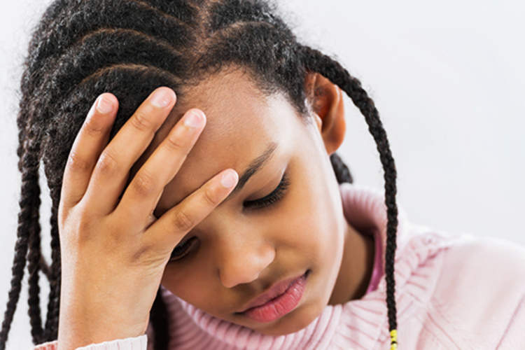 young girl with migraine headache image