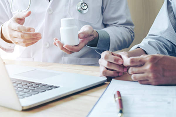 Doctor discussing treatment options with a patient.