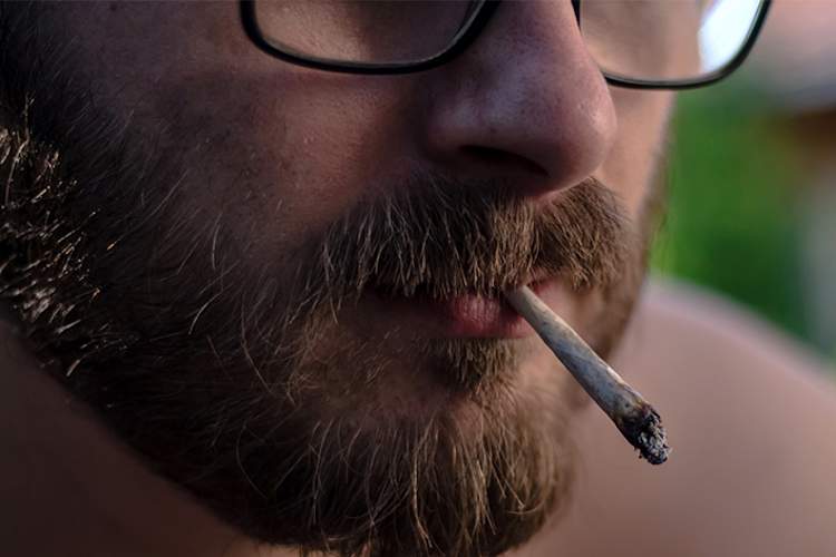 Man smoking pot.