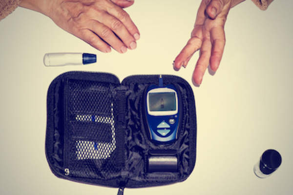 Blood glucose meter with large display screen.