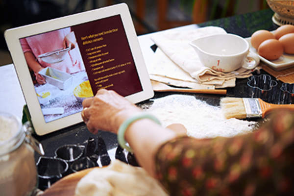Following a recipe on a tablet.