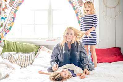 Mother with two daughters, a little overwhelmed.