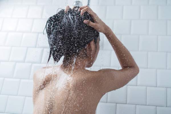 woman taking shower