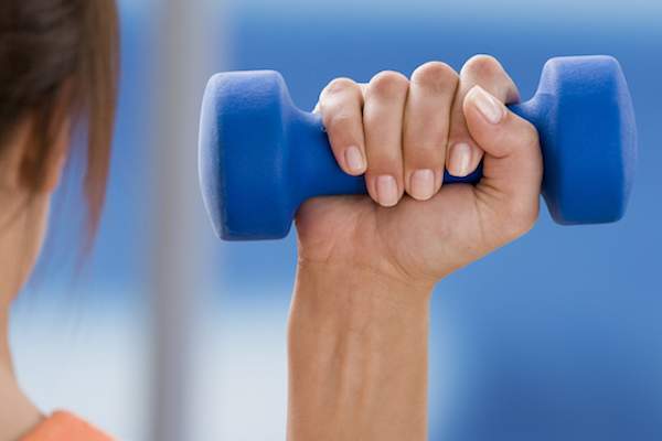 woman with dumbbell