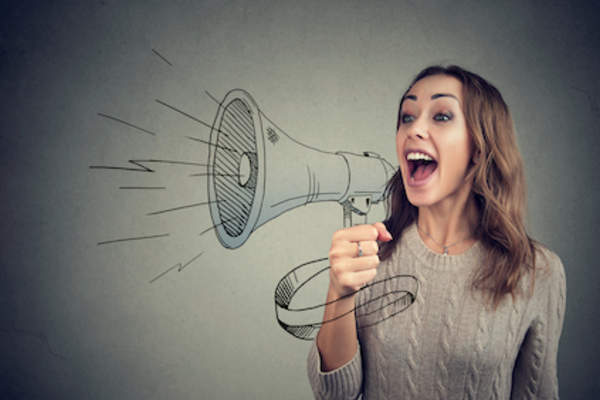 Woman with megaphone, share your story concept.