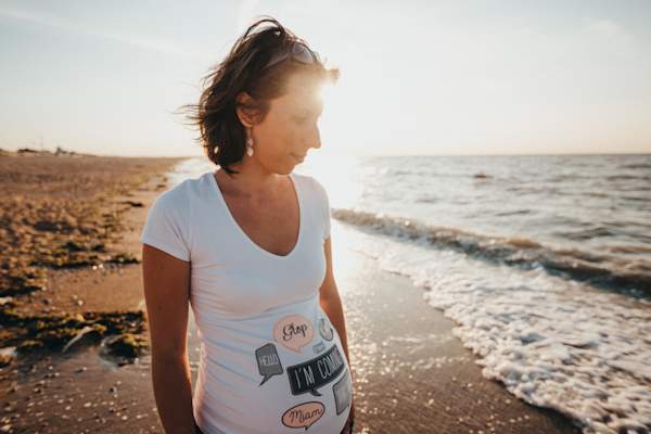 pregnant woman on beach