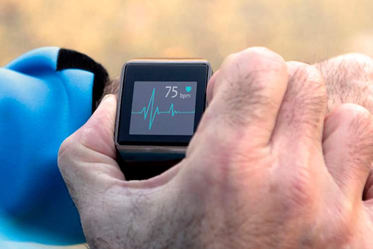Man using smartwatch, fitness tracker.
