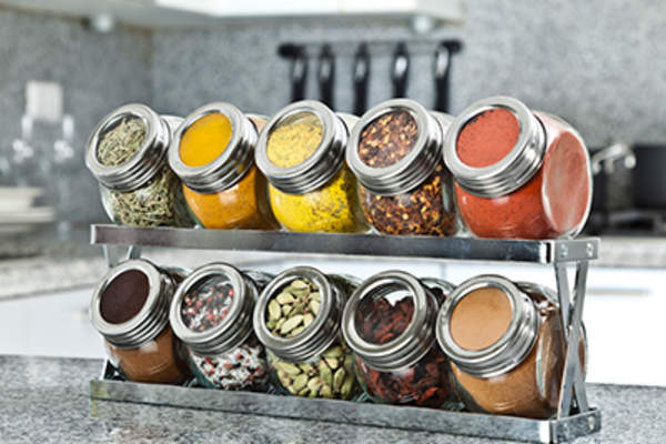 Spice rack on modern kitchen countertop.