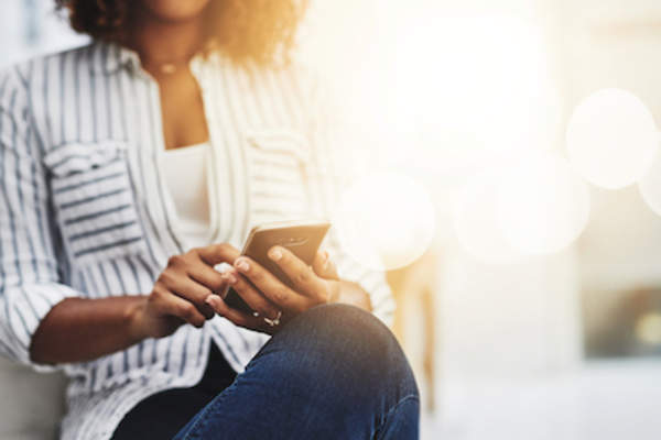 Woman using her iPhone