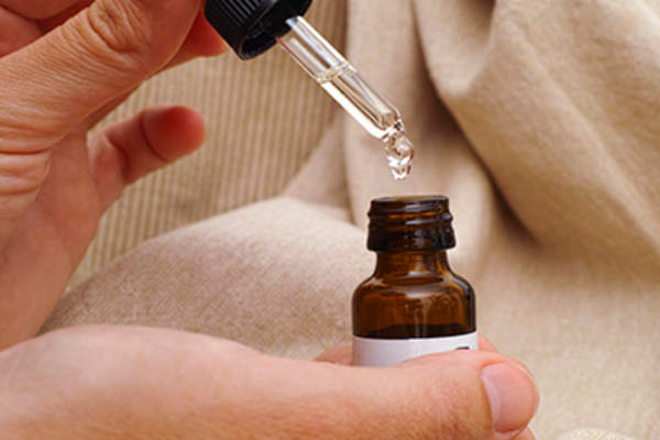 Medicine dropper and medicine bottle.