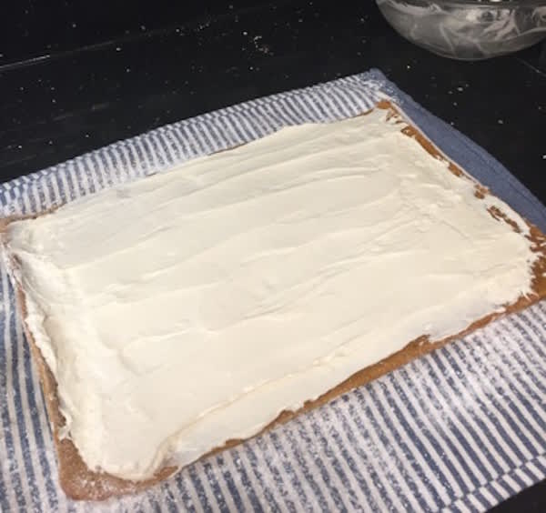 How to Make Gluten-Free Pumpkin Roll-cream cheese spread on cooled roll