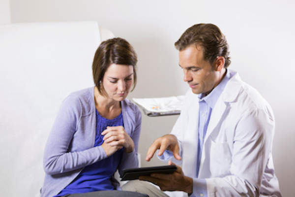 Patient and doctor talking about treatment options.