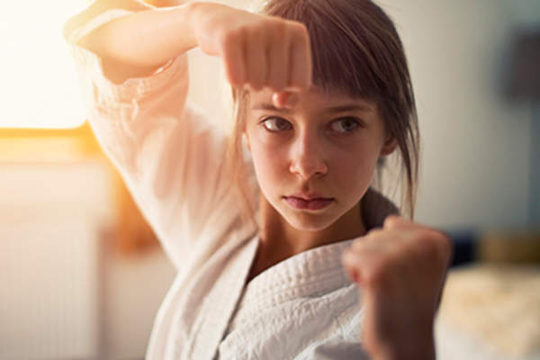 Girl practicing karate.