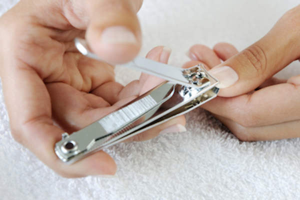 Clipping fingernails.