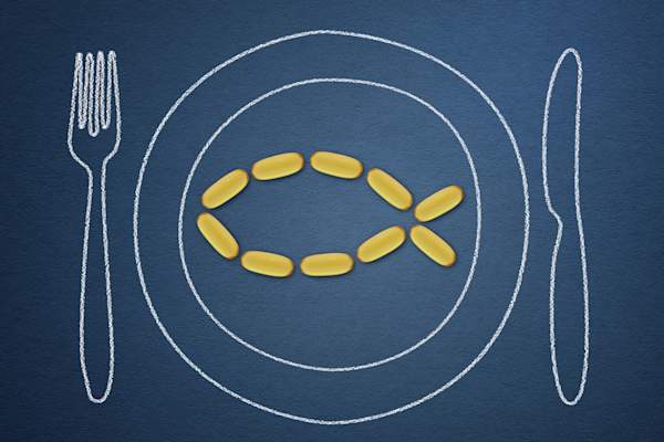 Fish shaped capsules on plate