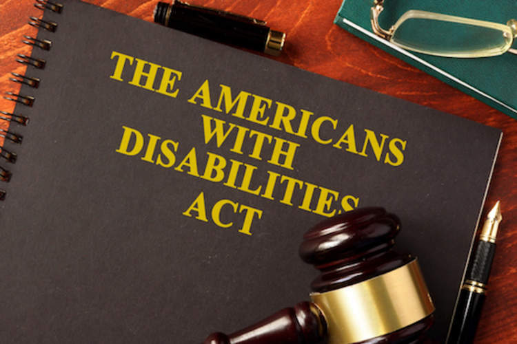 The Americans with Disabilities Act book with gavel