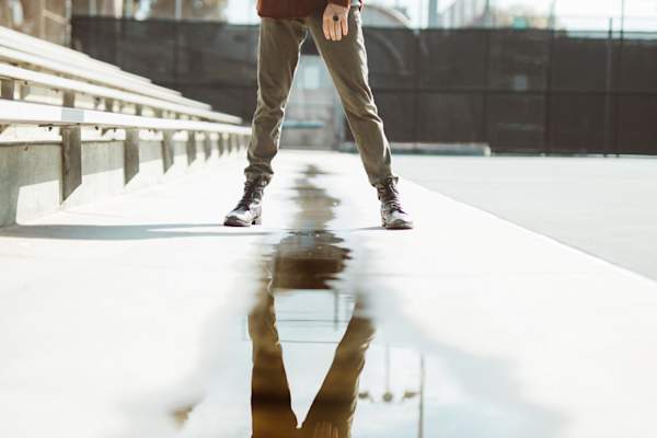 reflection of man's legs