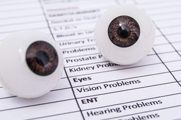 Plastic eye models and eye condition list.