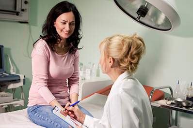 Middle age woman having a consultation at doctor's office