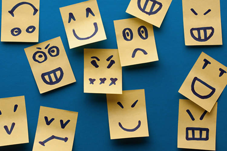 Smilies yellow stickers on blue background