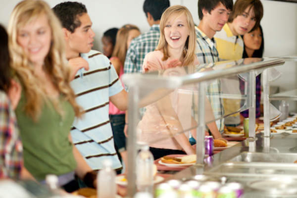 Students in line at college cafeteria.