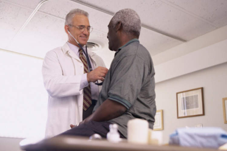 Man visiting doctors office.
