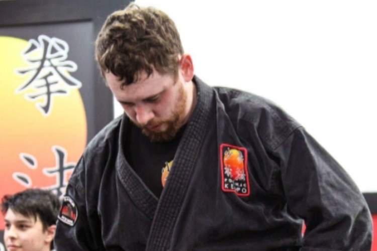 Ricky White in a karate uniform.