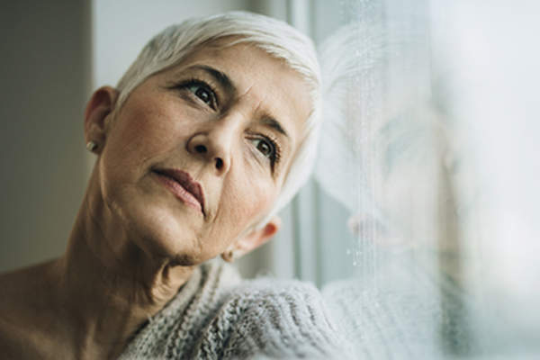 Pensive senior woman.