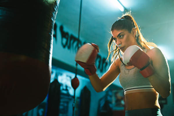 Woman boxing.