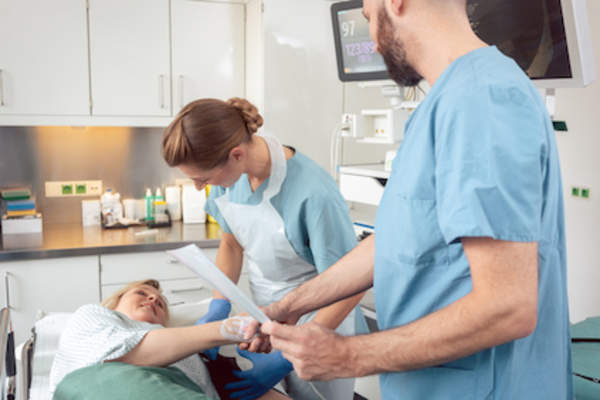 Greeting patient before procedure.