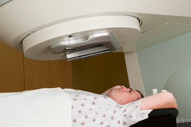 Man undergoing radiation therapy.